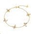 A gold-plated bracelet with delicate chain design and embellished with zircon stones and mother-of-pearl.