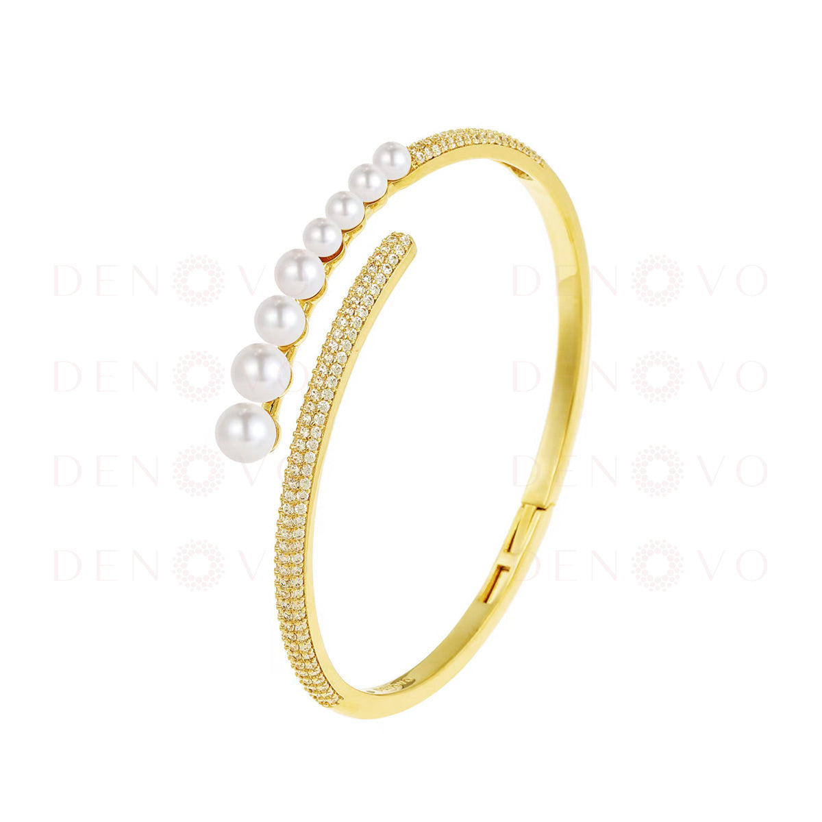 Gold bracelet with pearls on a white background