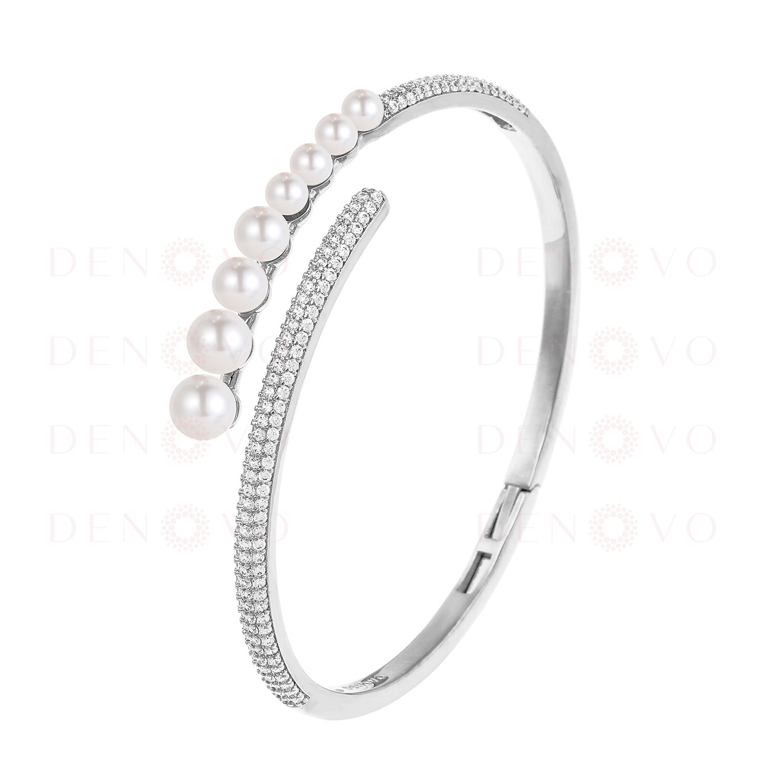 Silver bracelet with pearls and small stones on a white background