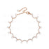 Pearl bracelet with rose gold chain on a white background