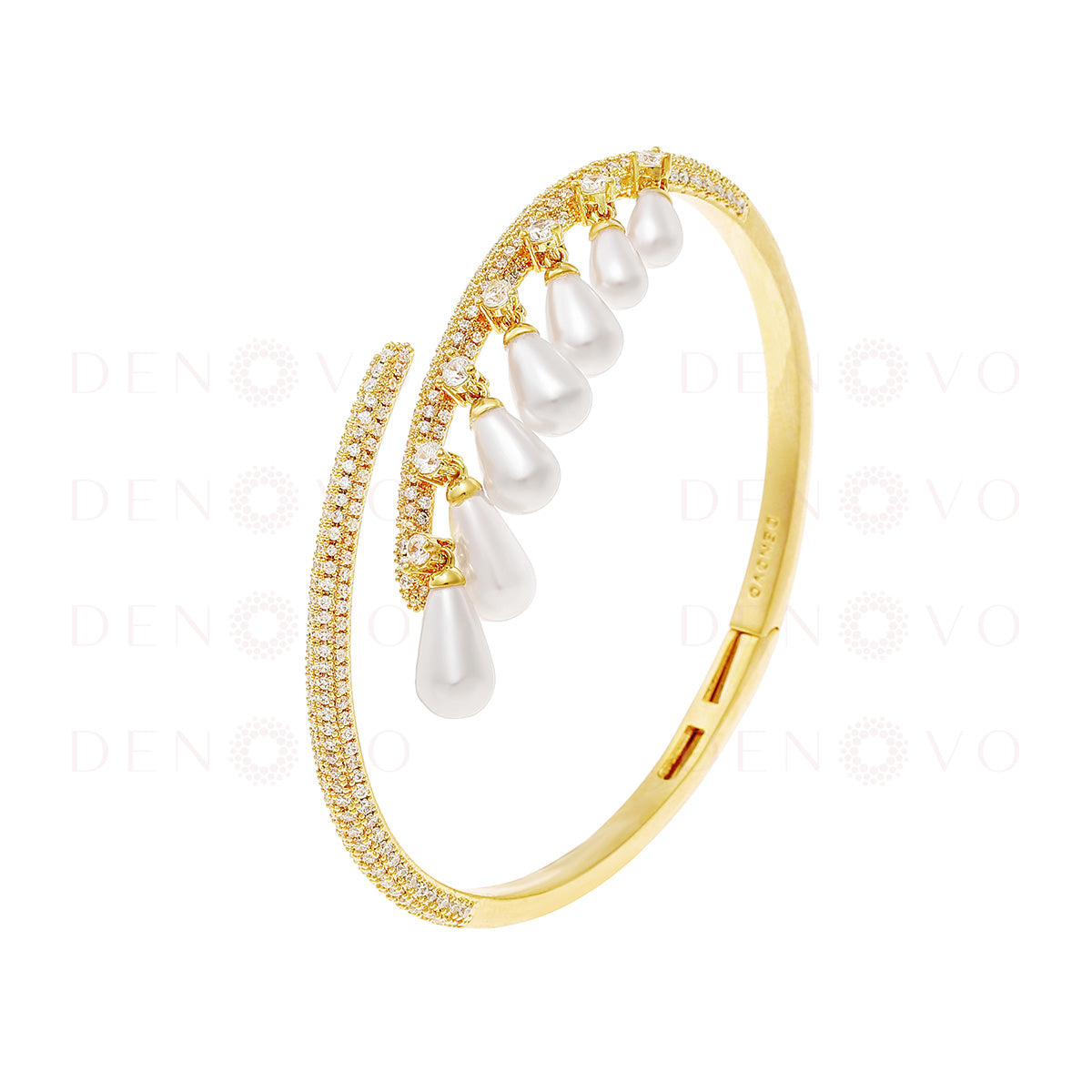 Gold bracelet with pearls on a white background