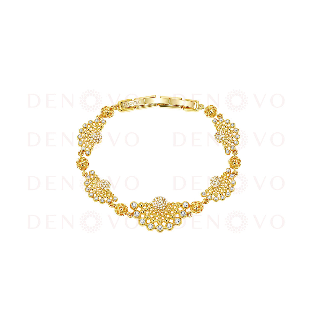 Gold bracelet with floral design on a white background