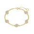 Gold bracelet with leaf-shaped diamond accents on a white background