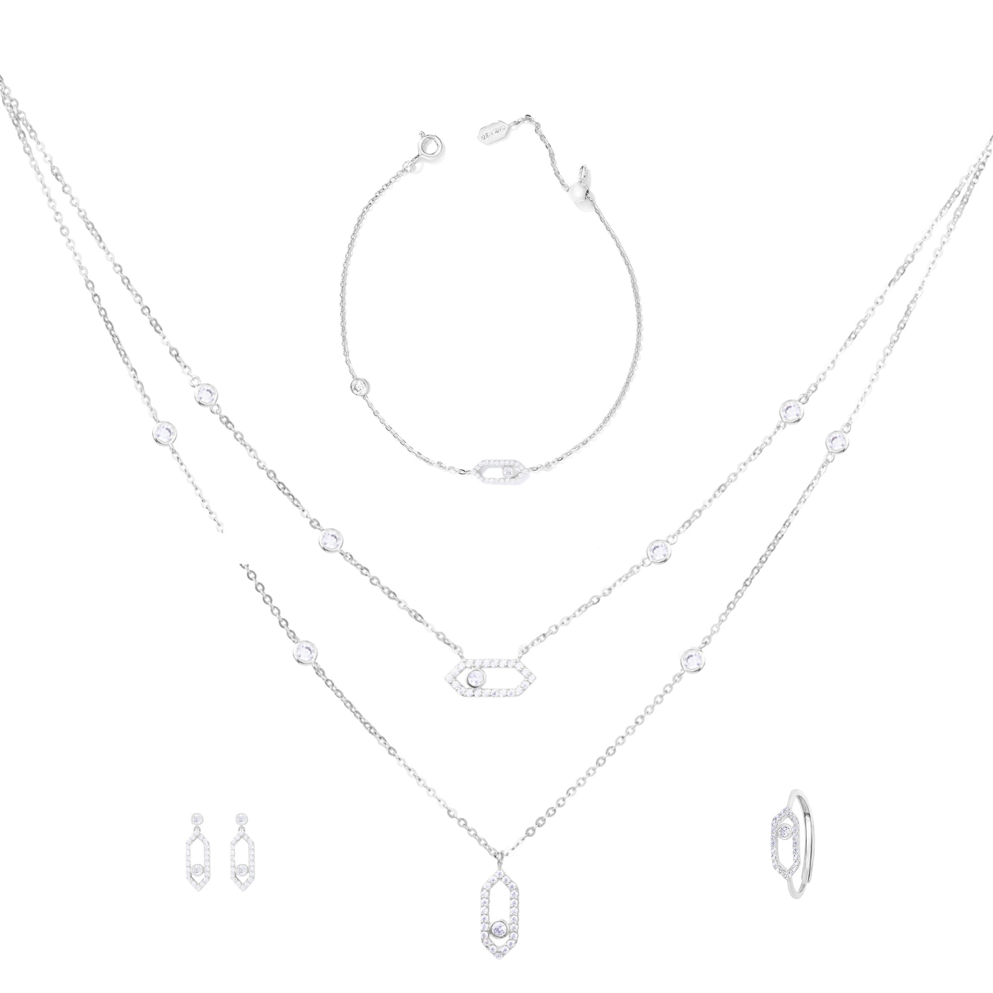 A set of silver jewelry including a necklace, bracelet, and earrings with small diamond-like embellishments.