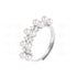 Silver ring with pearls and small diamonds on a white background