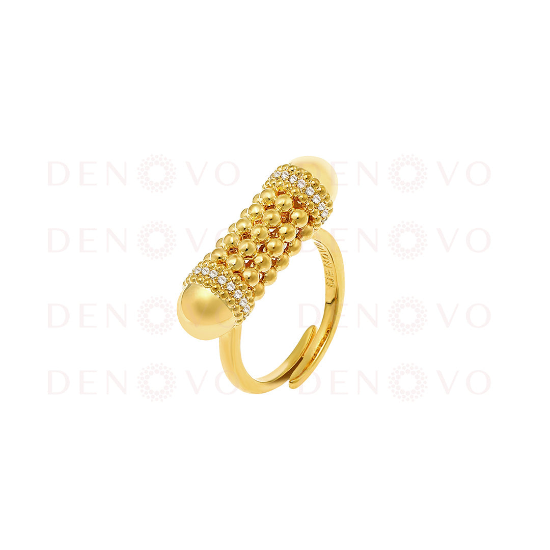 Gold ring with textured design on a white background